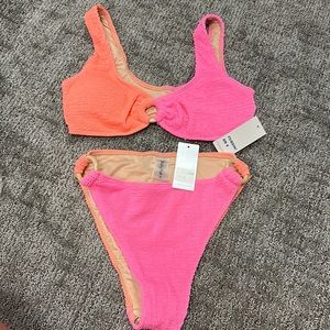 Pink and orange stretchy swimsuit